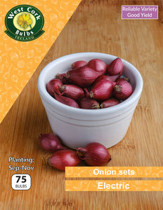 Bowl of red onion sets with West Cork Bulbs Ireland branding on a wooden background